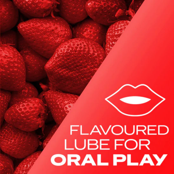 A close-up image of fresh strawberries filling the background, with a red diagonal overlay featuring a white outline of lips and the text: "FLAVOURED LUBE FOR ORAL PLAY".