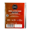 Front view of a single-pack brown and red-orange EXS Cola Scented Oral Latex Dam in clear plastic packaging, featuring white product text, dimensions (10" x 6"), safety icons, and a barcode at the bottom.