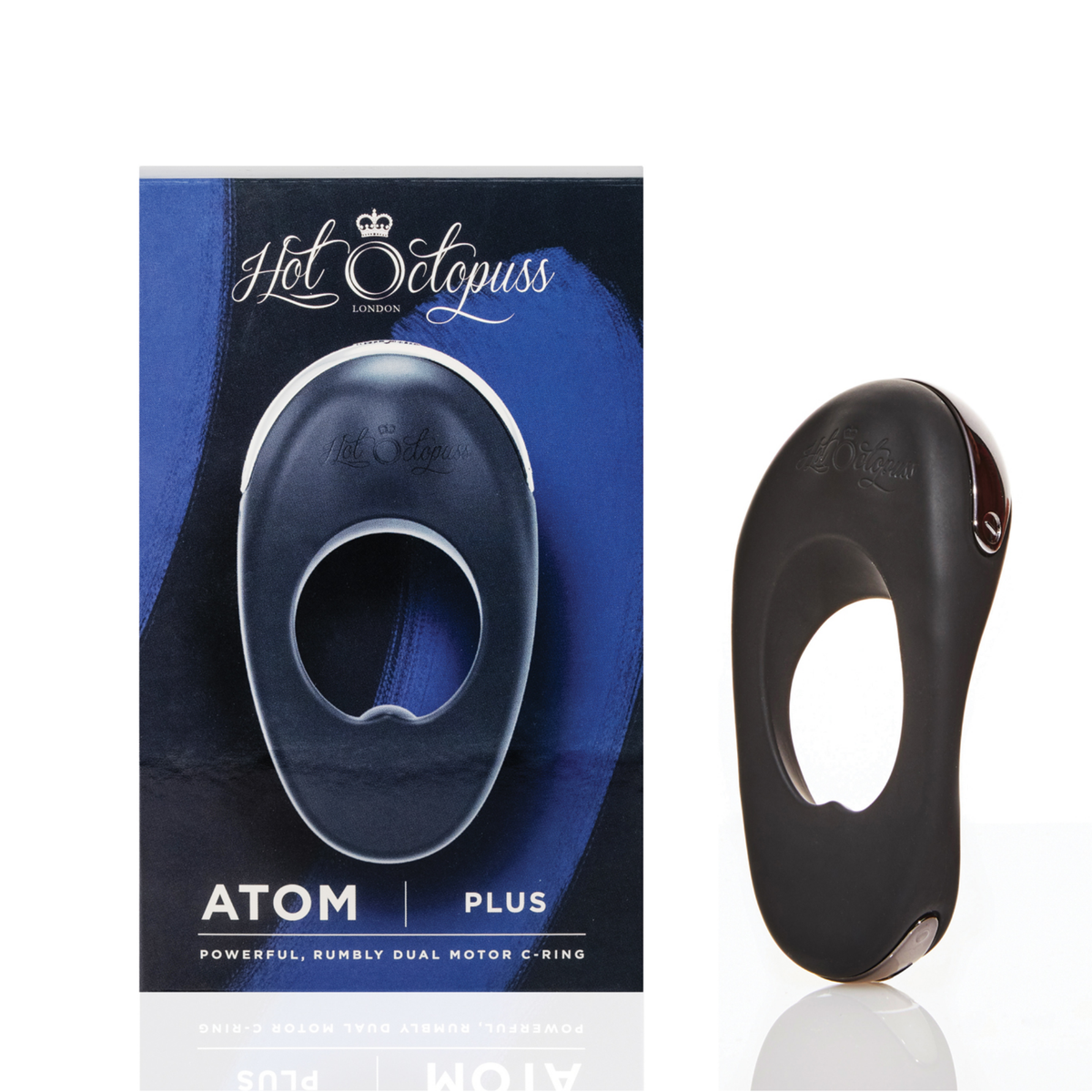 Product set view showing the black Hot Octopuss Atom Plus vibrating c-ring standing next to its blue and black retail packaging box. Imagen principal del producto