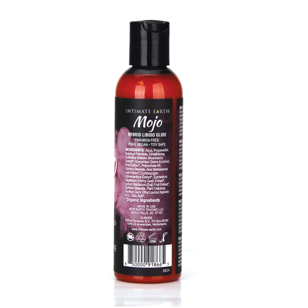 Back panel view of the 120 ml (4 fl oz) Intimate Earth Mojo hybrid libido glide bottle, detailing ingredients, paraben-free callout, manufacturer info, barcode, and pure vegan certification.