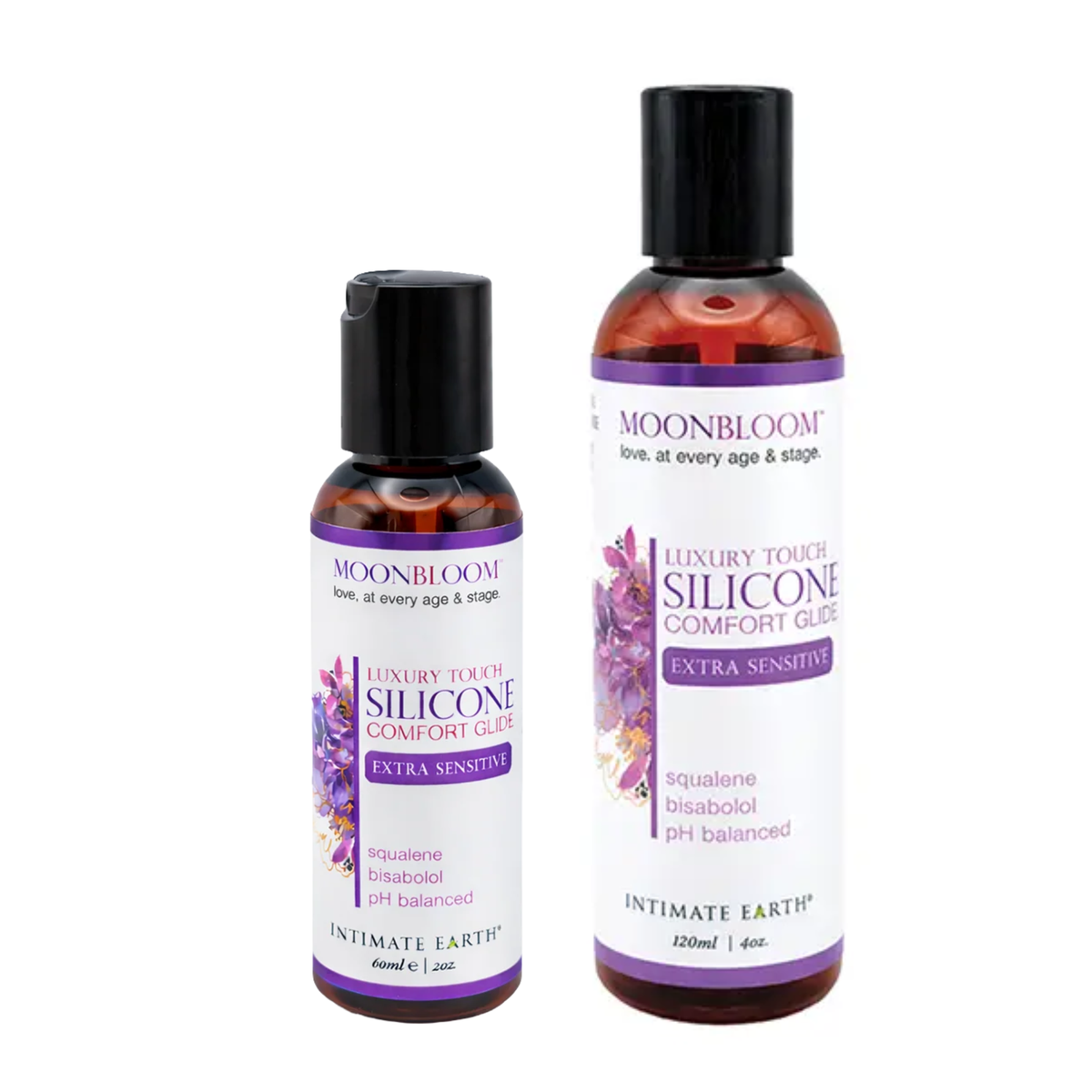Size comparison view showing two amber bottles of Intimate Earth Moon Bloom silicone comfort glide standing side by side in 60 ml (2 fl oz) and 120 ml (4 fl oz) capacities. Imagen principal del producto