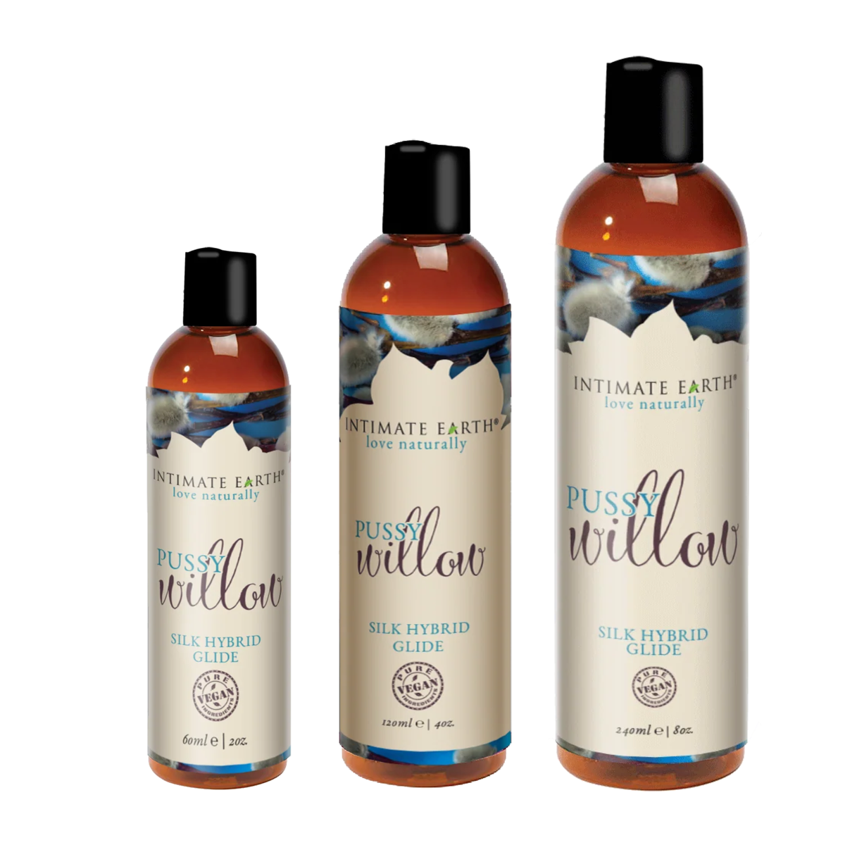 Size lineup shot displaying three amber bottles of Intimate Earth Pussy Willow silk hybrid glide standing side by side in 60 ml (2 fl oz), 120 ml (4 fl oz), and 240 ml (8 fl oz) capacities.