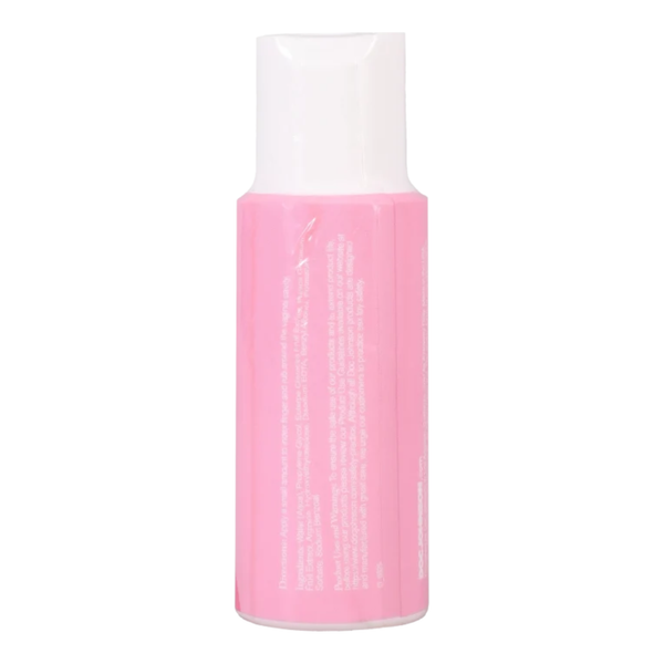 Rear view of the 2 fl oz (59 ml) pink bottle showing directions for application ("Apply a small amount to index finger and rub around the vaginal cavity"), ingredients, warnings, and Doc Johnson manufacturer text.