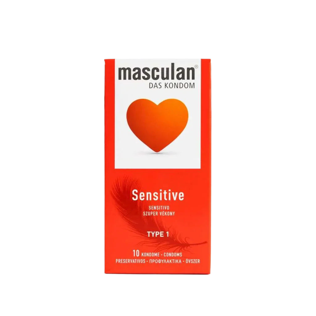 A red and white box of masculan® Sensitive condoms is shown. It features the brand name above an orange heart on a white square. Below, "Sensitive," "TYPE 1," and "10 KONDOME - CONDOMS" are printed above a feather illustration. Imagen principal del producto