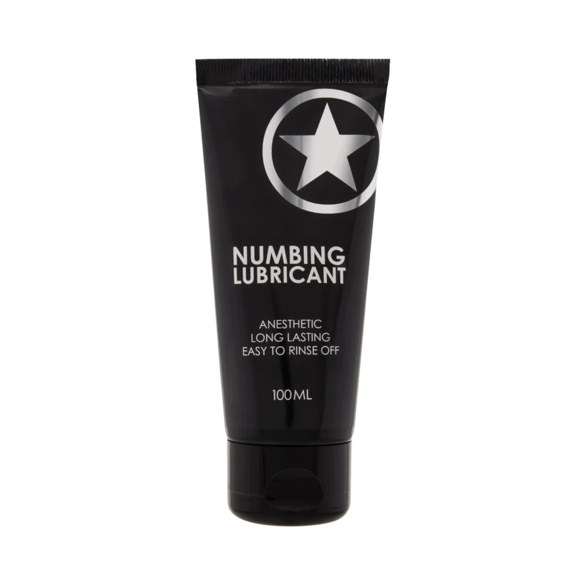 Front product view of a 100 ml (3.38 fl oz) matte black squeeze tube of Shots Numbing Lubricant featuring a prominent silver star emblem at the top and white text detailing "Anesthetic," "Long Lasting," and "Easy to Rinse Off". Imagen principal del producto