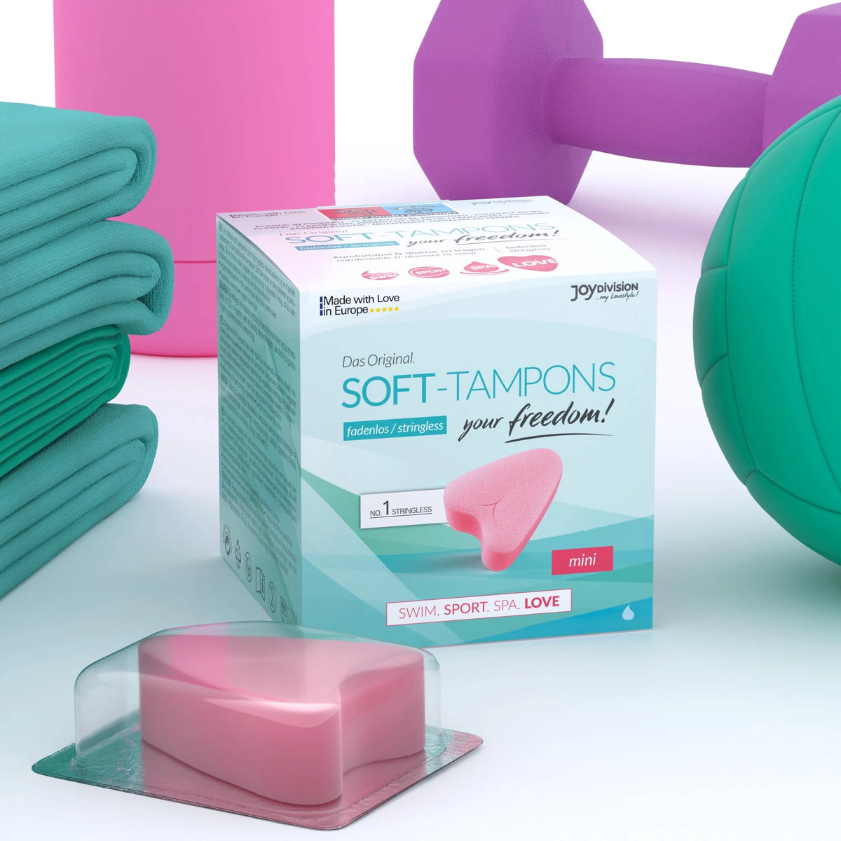 Soft-Tampons Mini by JoyDivision, shown with a single tampon removed from its box. Ideal for discreet protection during swimming, sports, spa visits, and intimate moments. Stringless design for comfort and freedom.