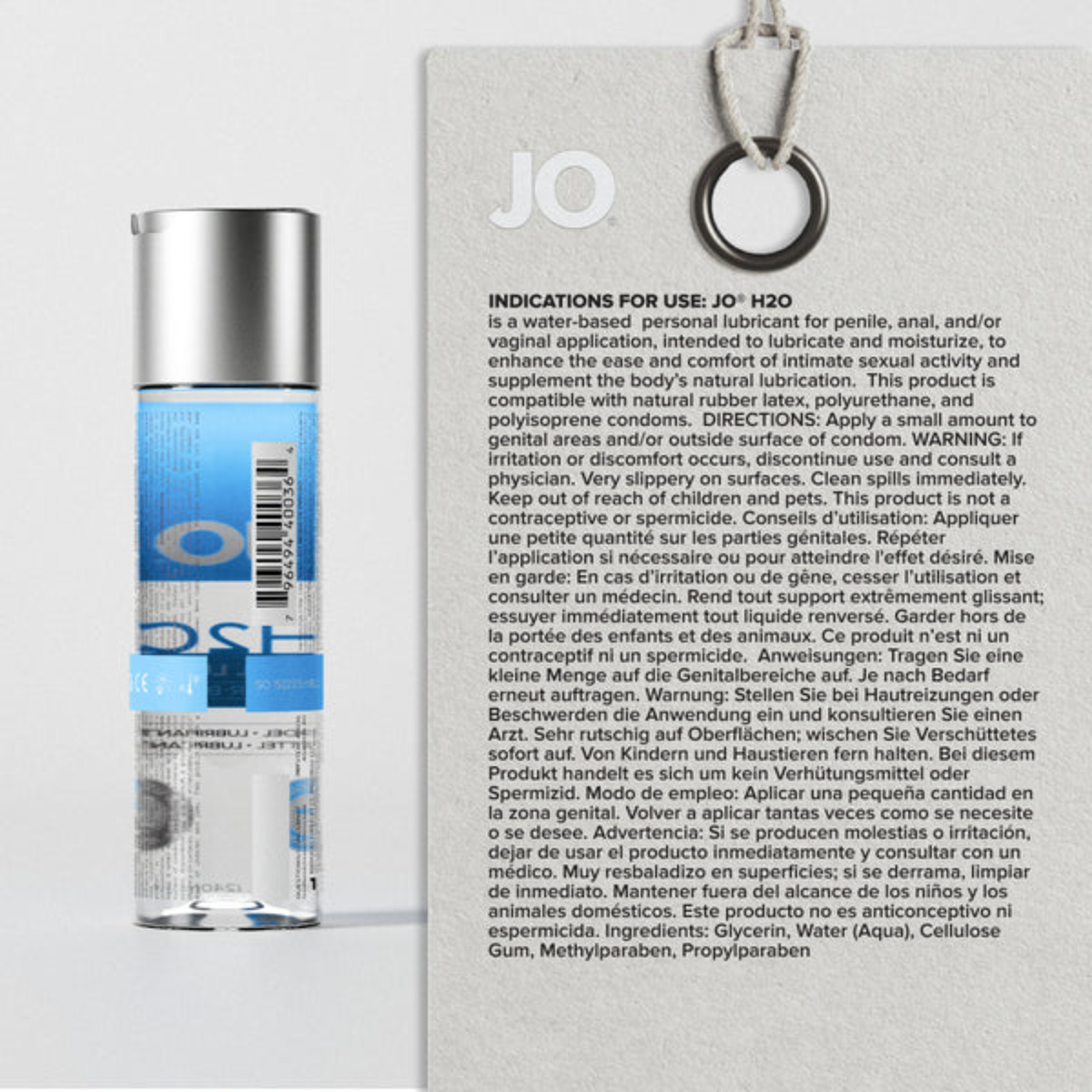 A black and white photograph of a happy couple smiling in bed. The red "JO" logo is displayed next to text introducing H2O Original as "the everyday essential" for solo, partner, or toy play.