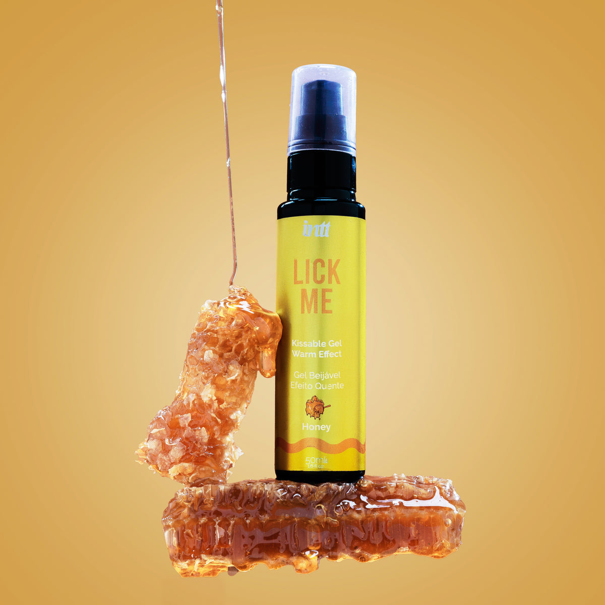 Bottle labeled 'Lick Me' with honey on a yellow background